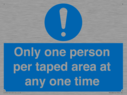 only-one-person-per-taped-area-at-any-one-time~
